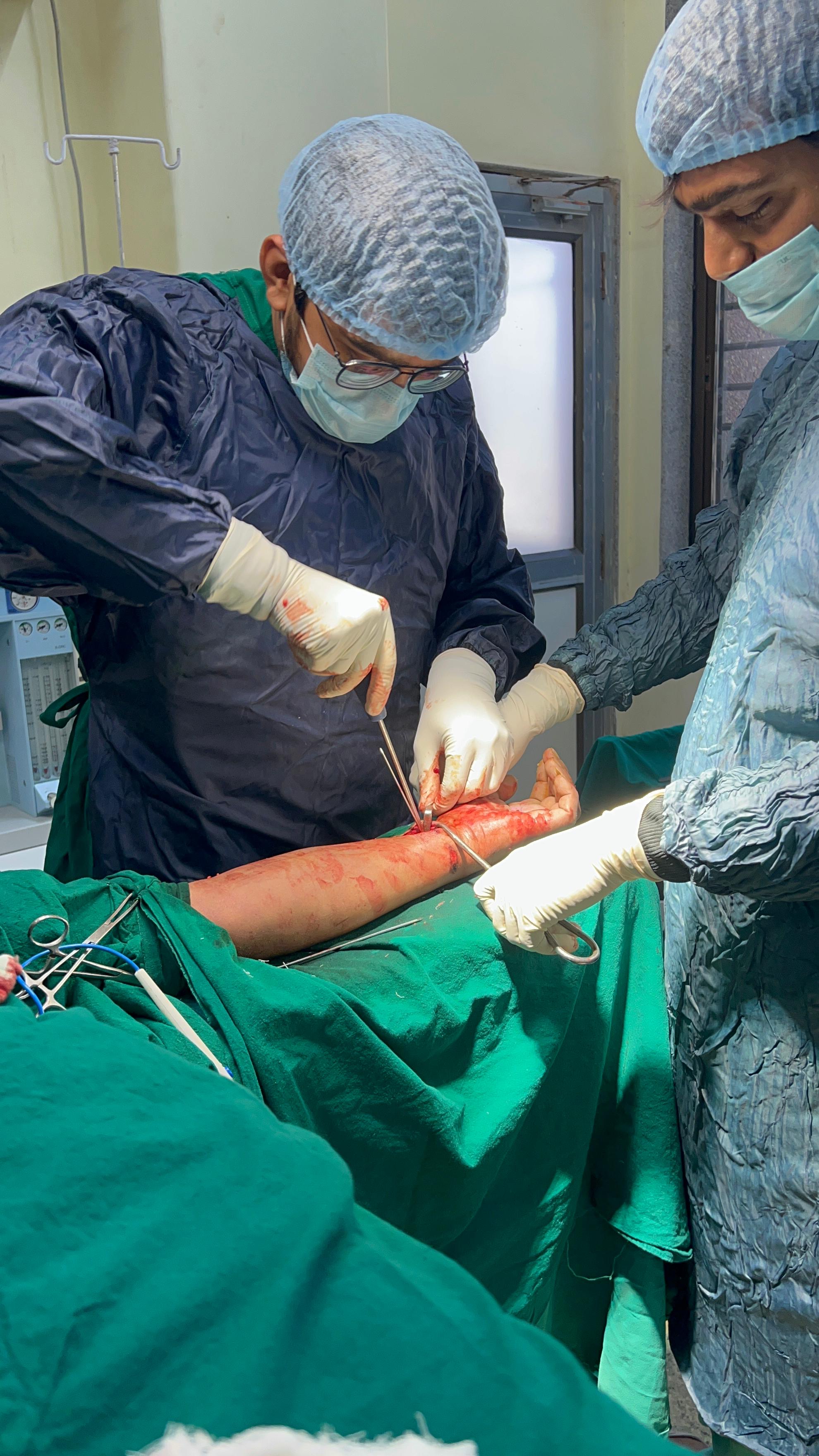 Dr. Jigar Sundesha during surgery consultation